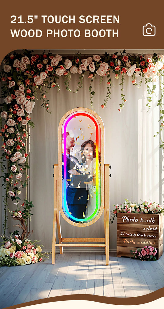 Bring rustic elegance to your events with this 21.5-inch Oval Wooden Mirror Photo Booth. Featuring a capacitive touchscreen, 55” mirror surface, RGB ambient lighting, DSLR + printer compatibility, and easy transport with flight case packaging — perfect for weddings, birthdays, and boutique activations.